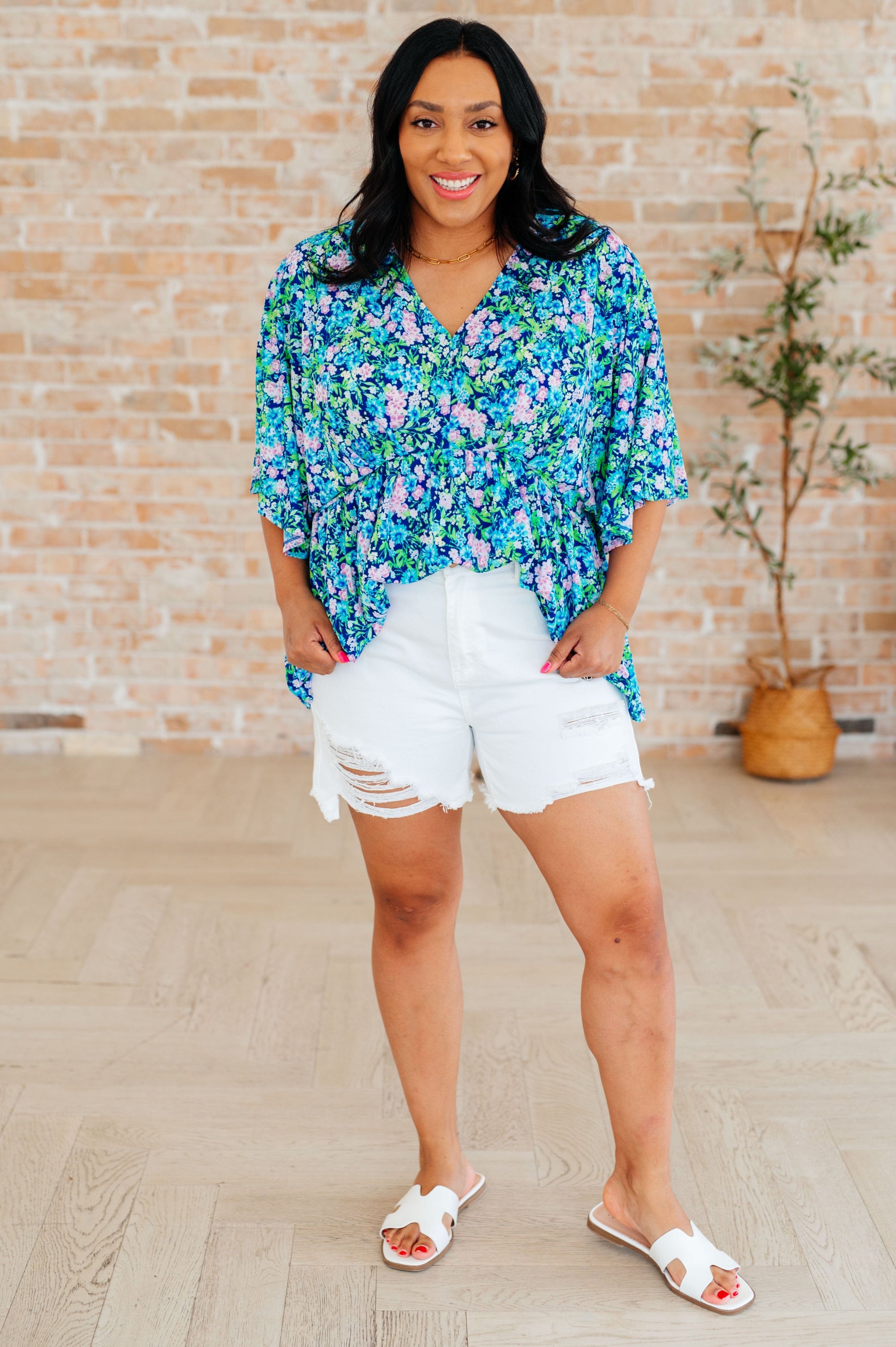 Dreamer Peplum Top in Navy and Mint Floral Tops Ave Shops 