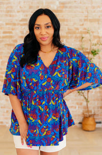 Dreamer Peplum Top in Royal and Red Abstract Tops Ave Shops 